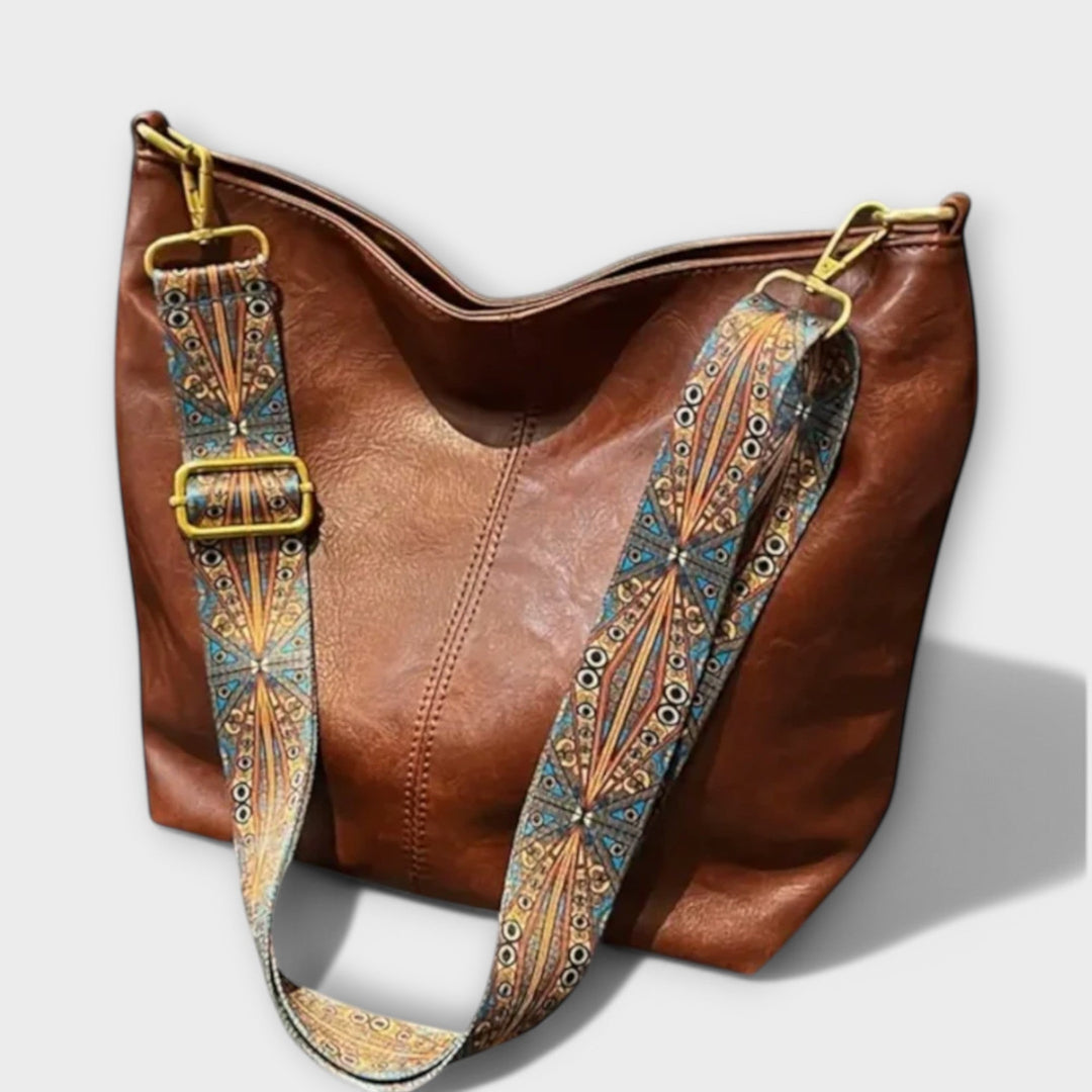 Eelkje Schultertasche mit einzigartigem Riemen Foto 1