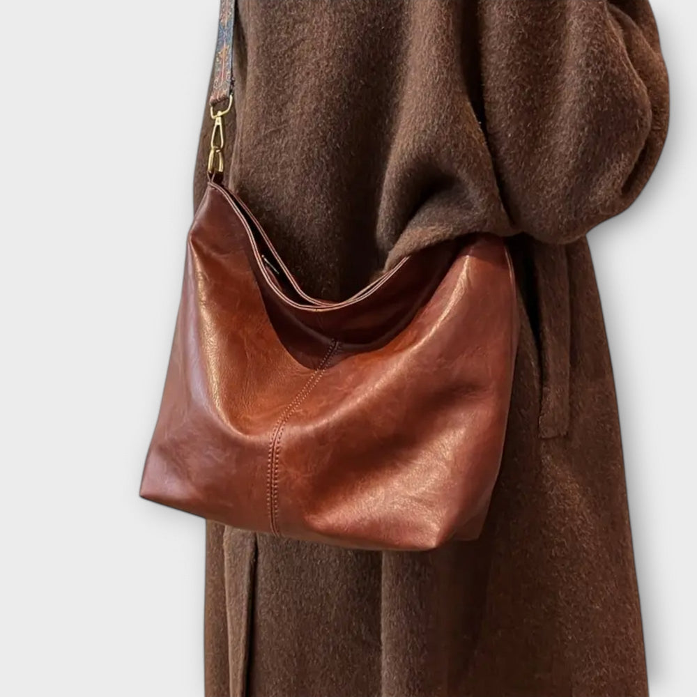 Eelkje Schultertasche mit einzigartigem Riemen Foto 2