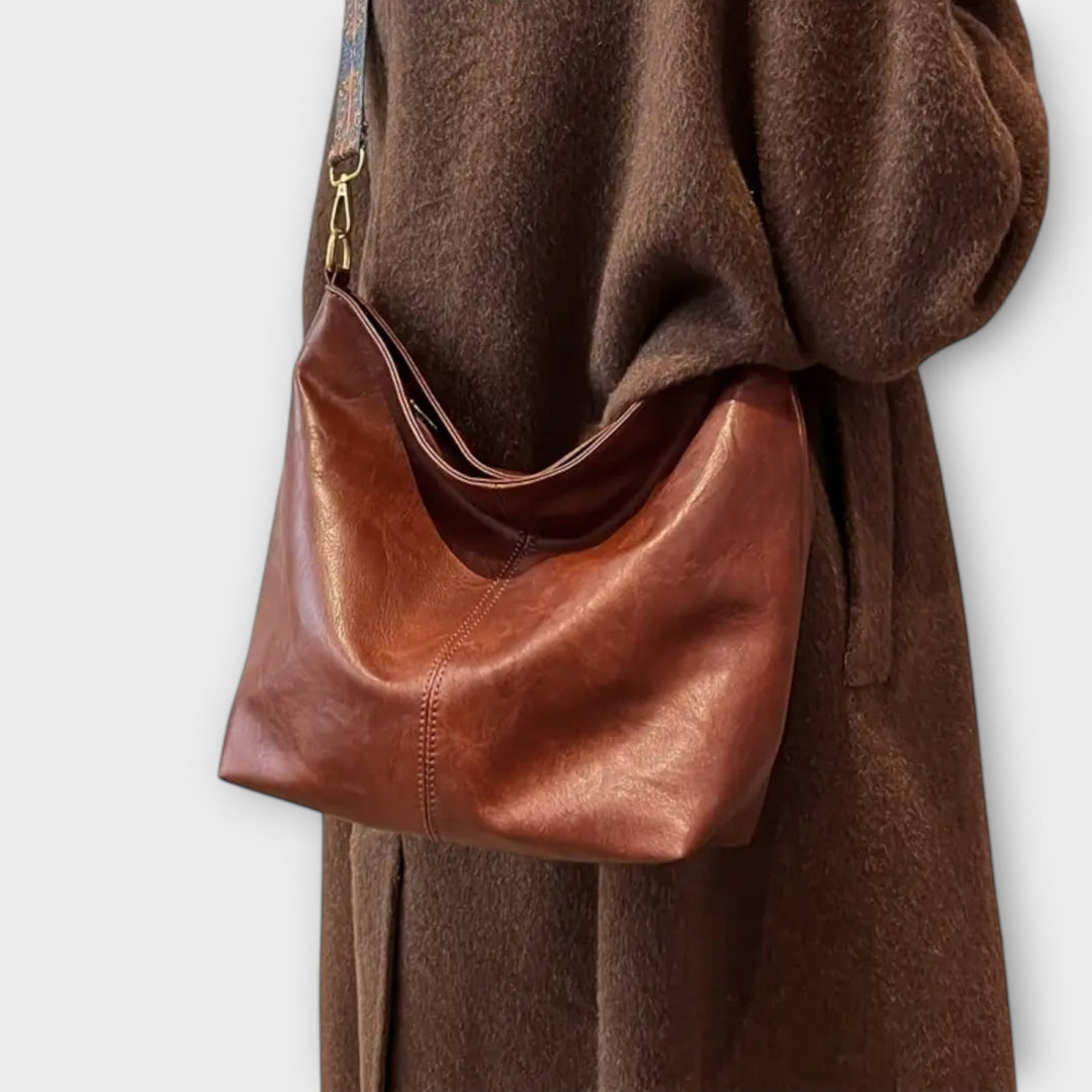 Eelkje Schultertasche mit einzigartigem Riemen Foto 2