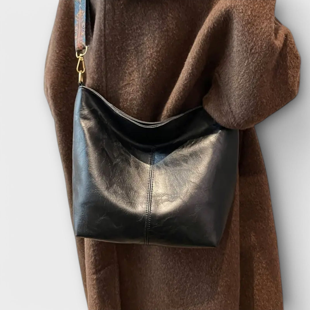 Eelkje Schultertasche mit einzigartigem Riemen Foto 3