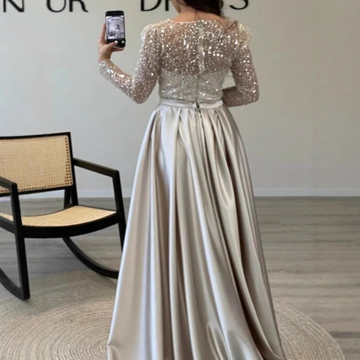 Eldrid Abendkleid mit Perlenoberteil und Satinrock Foto 4
